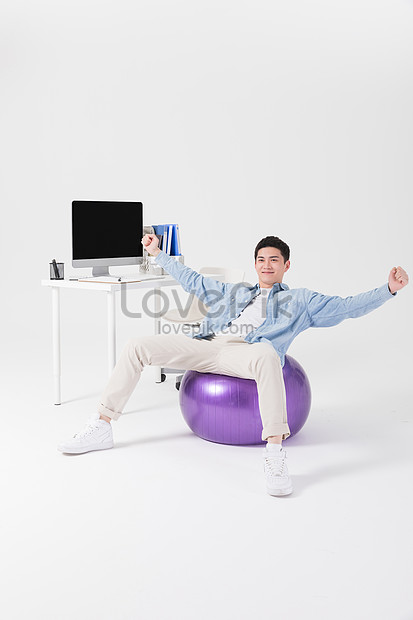 Young Staff Are Sitting On A Yoga Ball Photo Image Picture Free