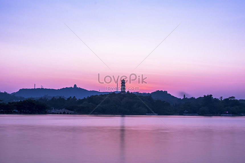 The Sunset Background Of The Mountains And Lakes Photo