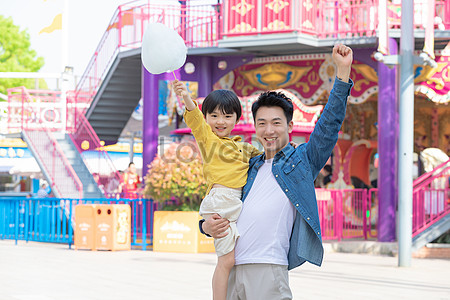 Father and son amusement park play Free Download. 