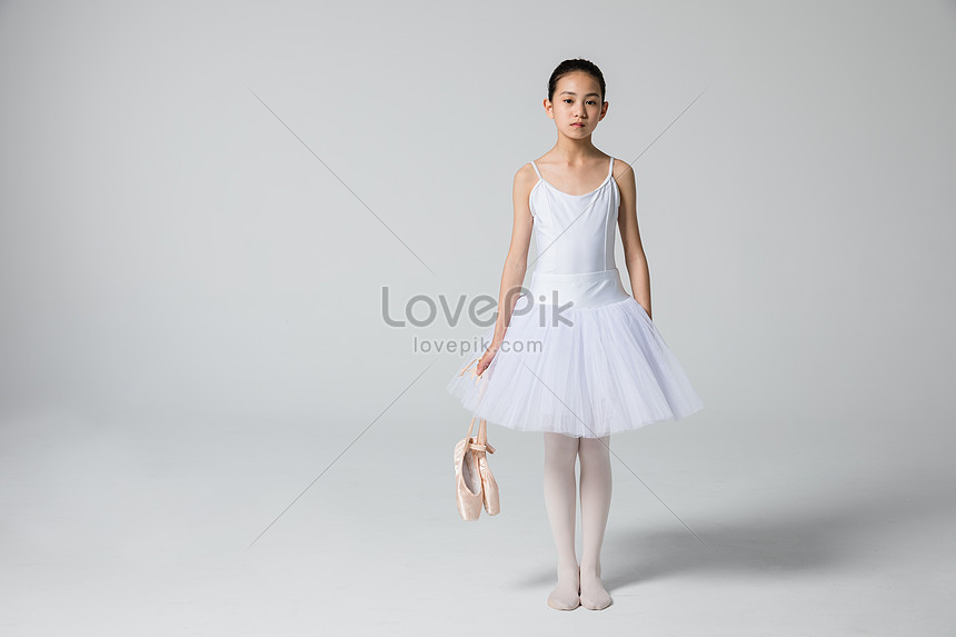 Little girl kneeling dance shoes photo 