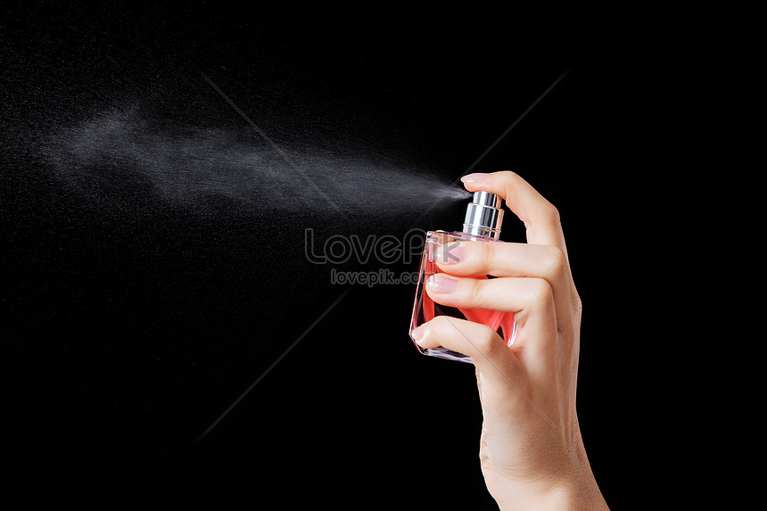 lady spraying perfume