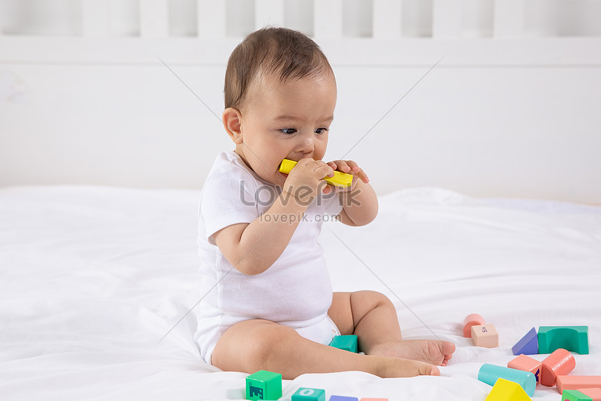 Playing On The Crib Photo Image Picture Free Download