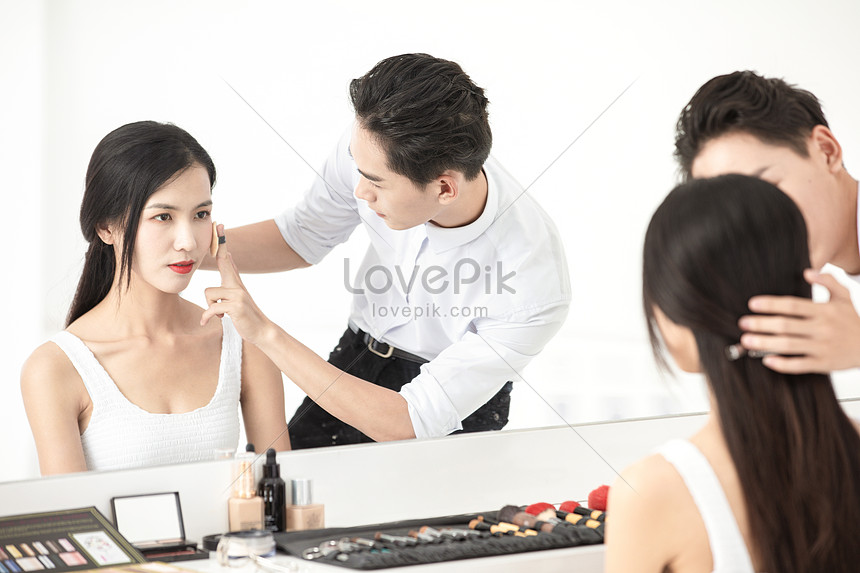Makeup Artist Gives Makeup To The Model
