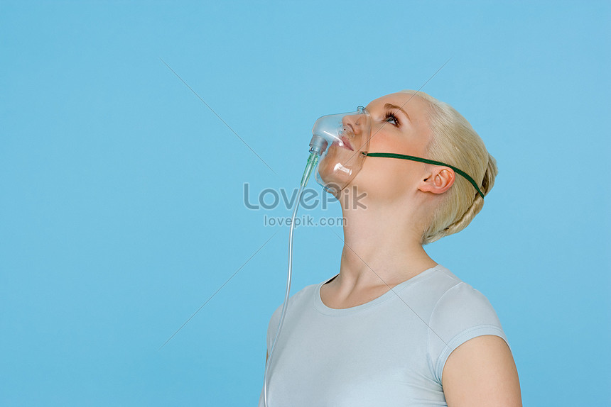 Download Young Woman Wearing An Oxygen Mask Photo Image Picture Free Download 501470208 Lovepik Com PSD Mockup Templates