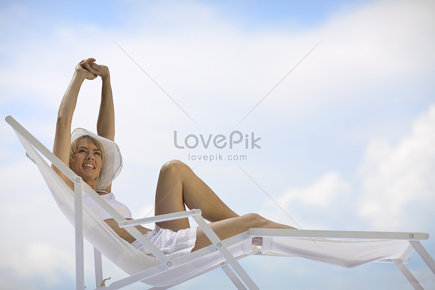 Woman Lying In The Sun Picture And HD Photos | Free Download On Lovepik