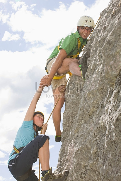 Boys rock climbing photo image_picture 
