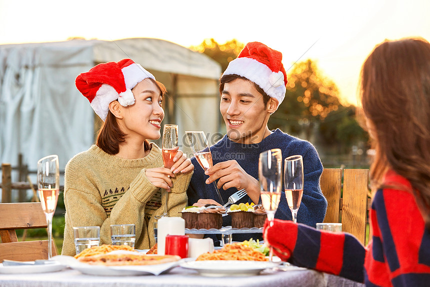 Young People Clinking Glasses At Christmas Party Picture And Hd Photos 