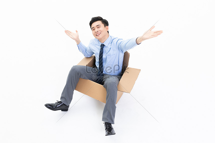 Sitting man sitting on boxes hi-res stock photography and images