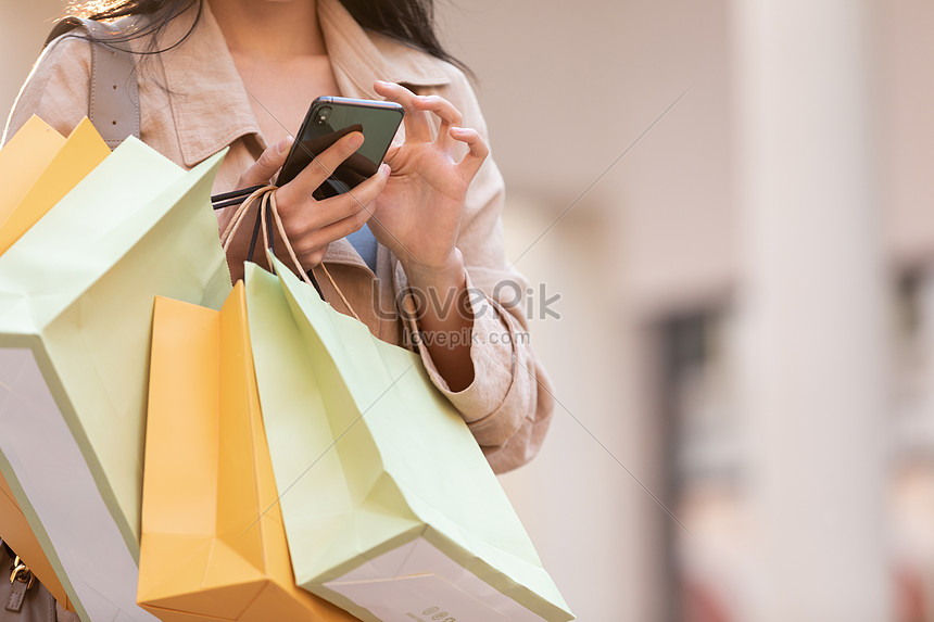 Female Mall Shopping Playing Mobile Phone Close Up Photo Image Picture Free Download Lovepik Com