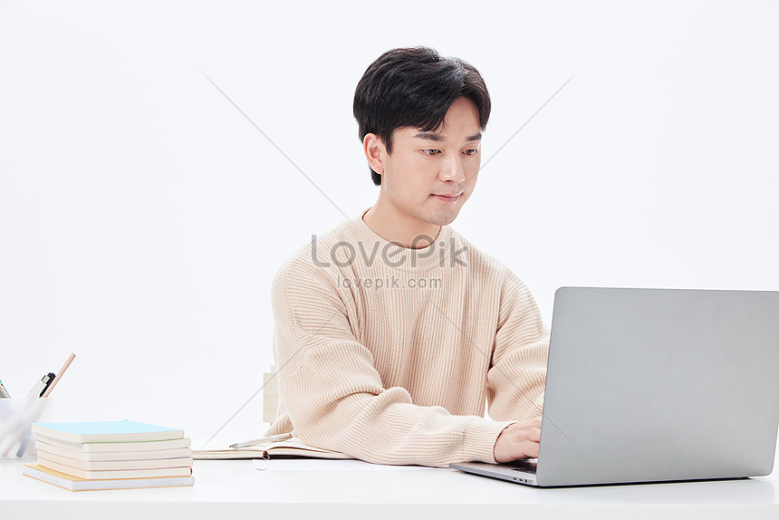 College Students Using Computers To Look Up Information And Study