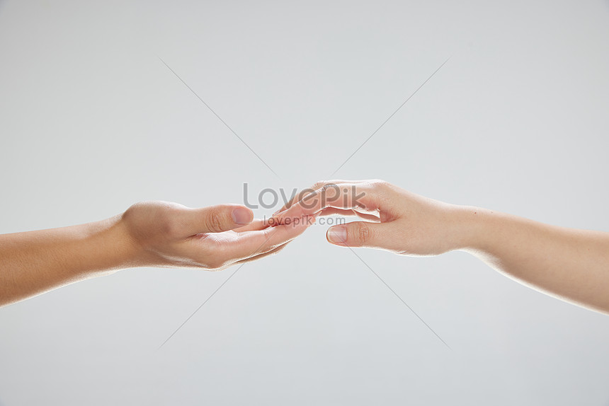 people holding hands photography
