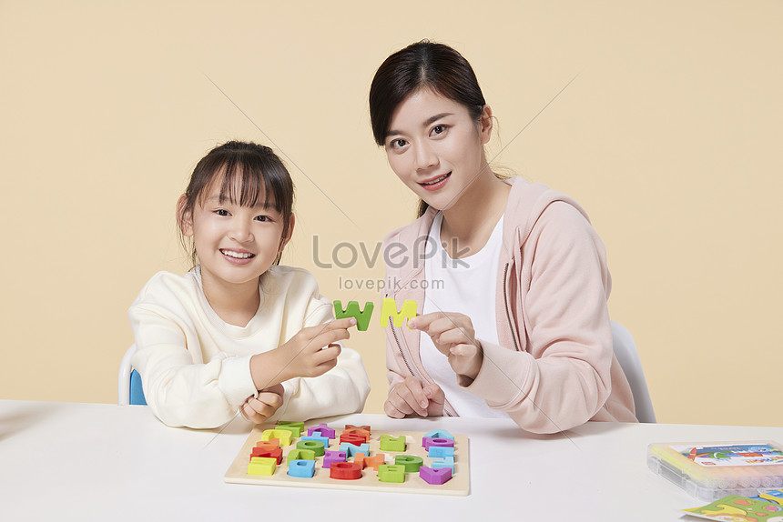 Mother And Daughter Take English Letters At Home Picture And HD Photos ...