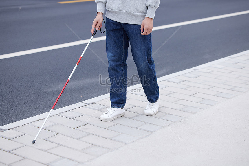 Close-up Of A Blind Person Who Uses A Blind Cane To Find The Way Out  Picture And HD Photos