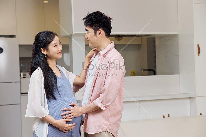 husband-taking-care-of-pregnant-wife-at-home-picture-and-hd-photos