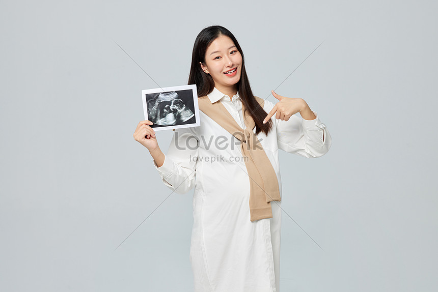 Pregnant Mother Holding B Ultrasound Picture And HD Photos | Free ...