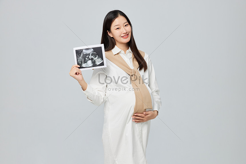 Pregnant Mother Holding B Ultrasound Picture And HD Photos | Free ...