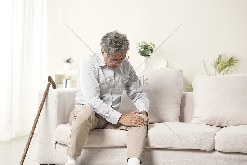 Elderly Man With Uncomfortable Knees On Sofa Picture And HD Photos ...